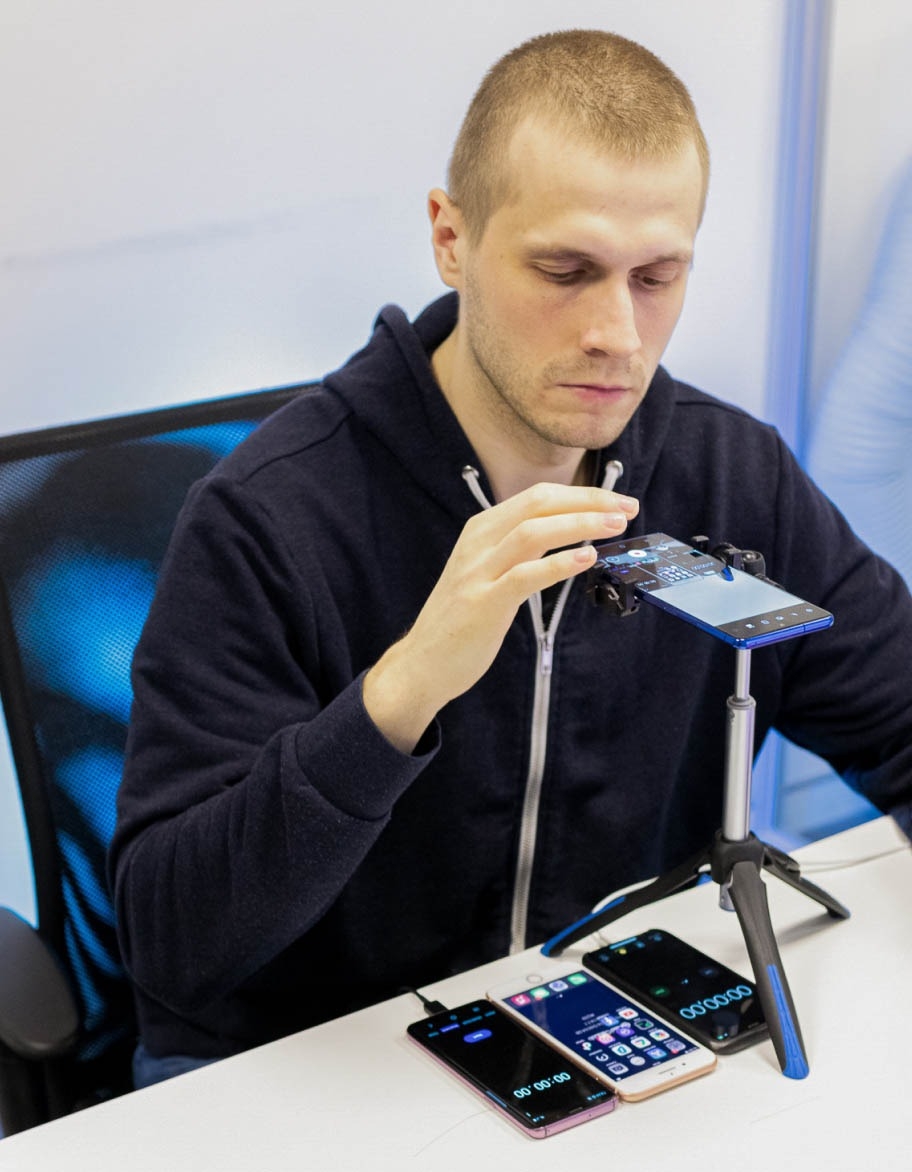 Software quality assurance engineer working on mobile application testing project.